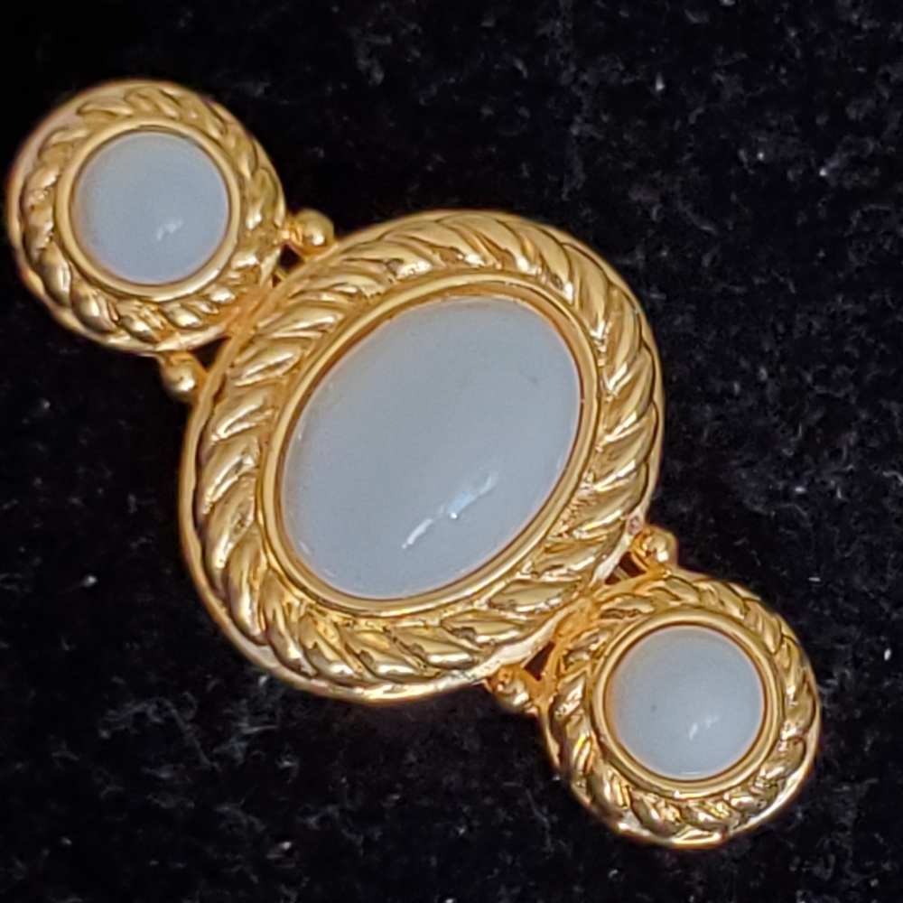 Monet goldtone brooch with white stones